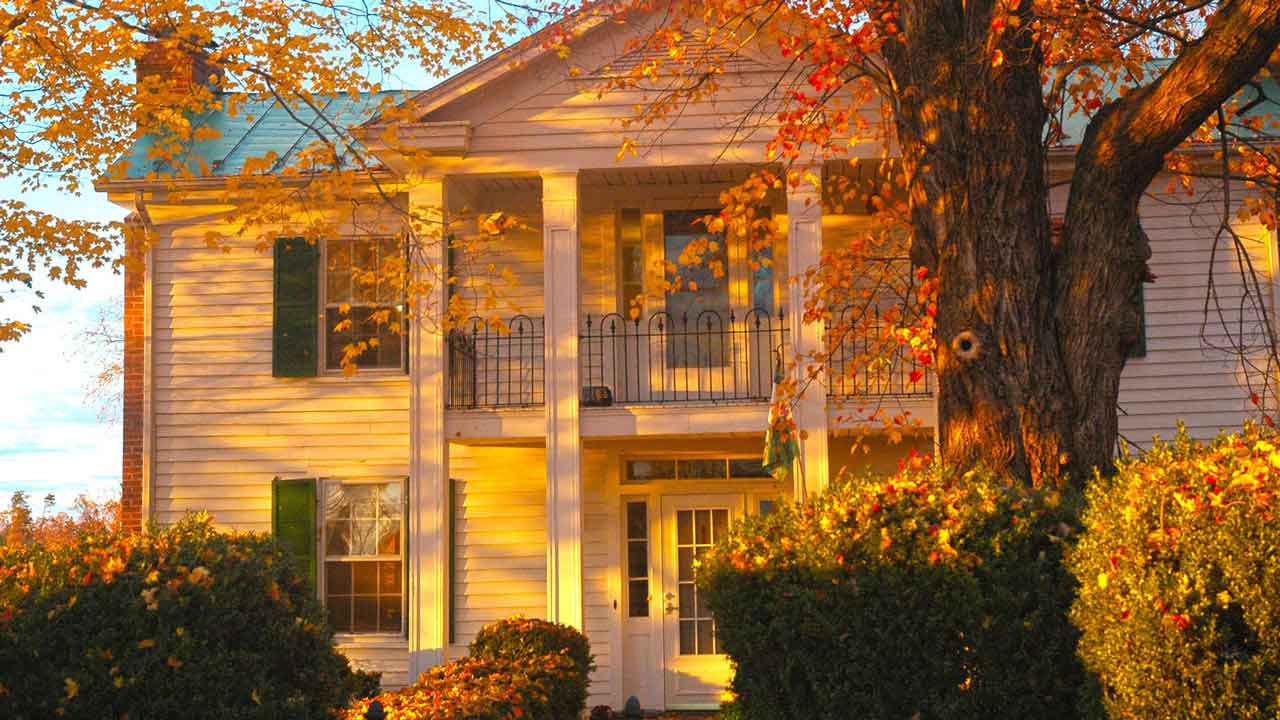 A charming historic home bathed in moring light.